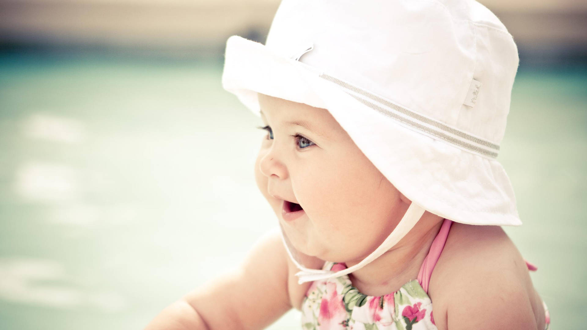 Cute Baby Girl Pink Hat Wallpaper