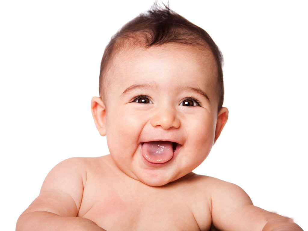 Unbebé Está Sonriendo Sacando La Lengua
