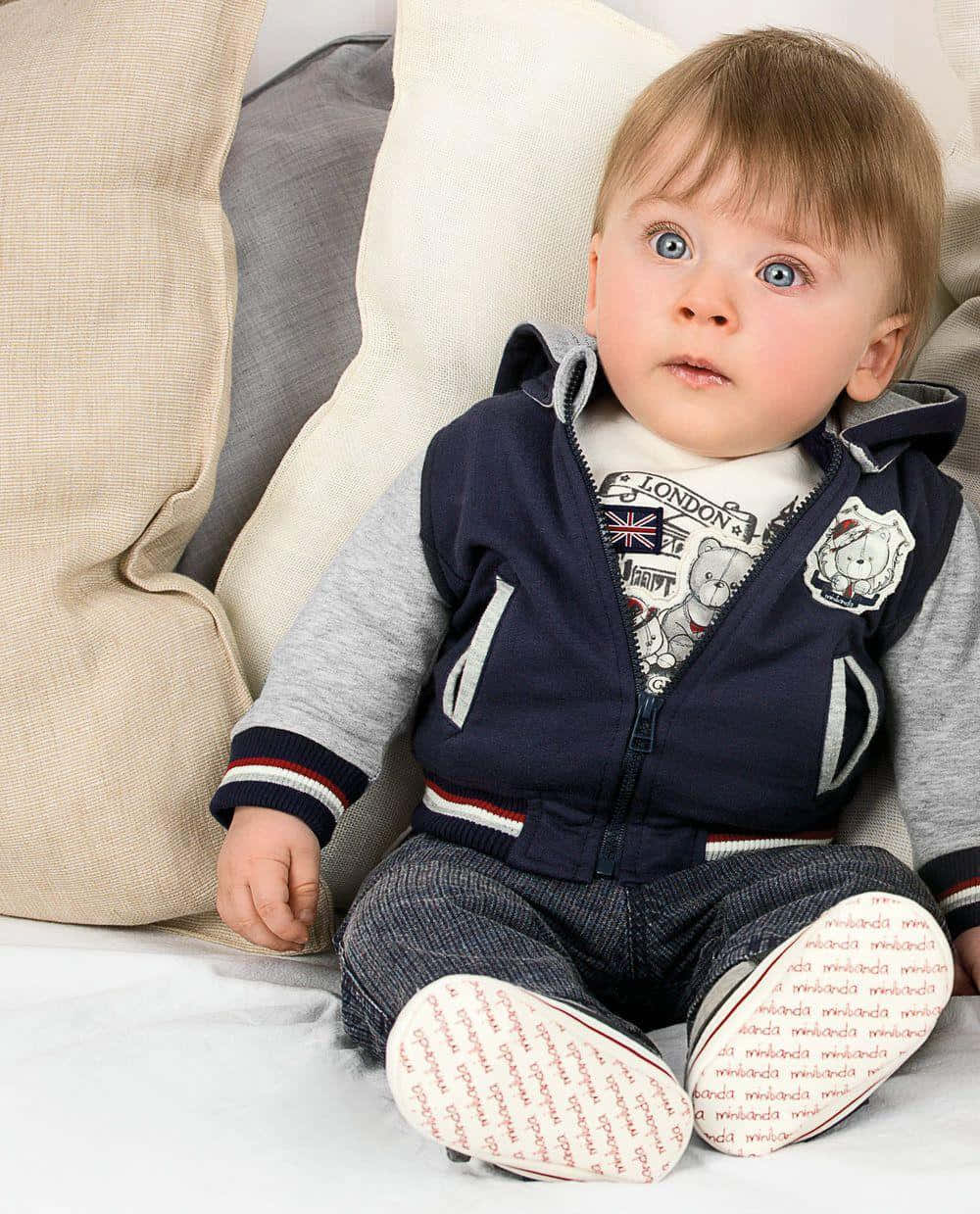 Download Cute Baby Stylish Boy Sitting Wallpaper | Wallpapers.com