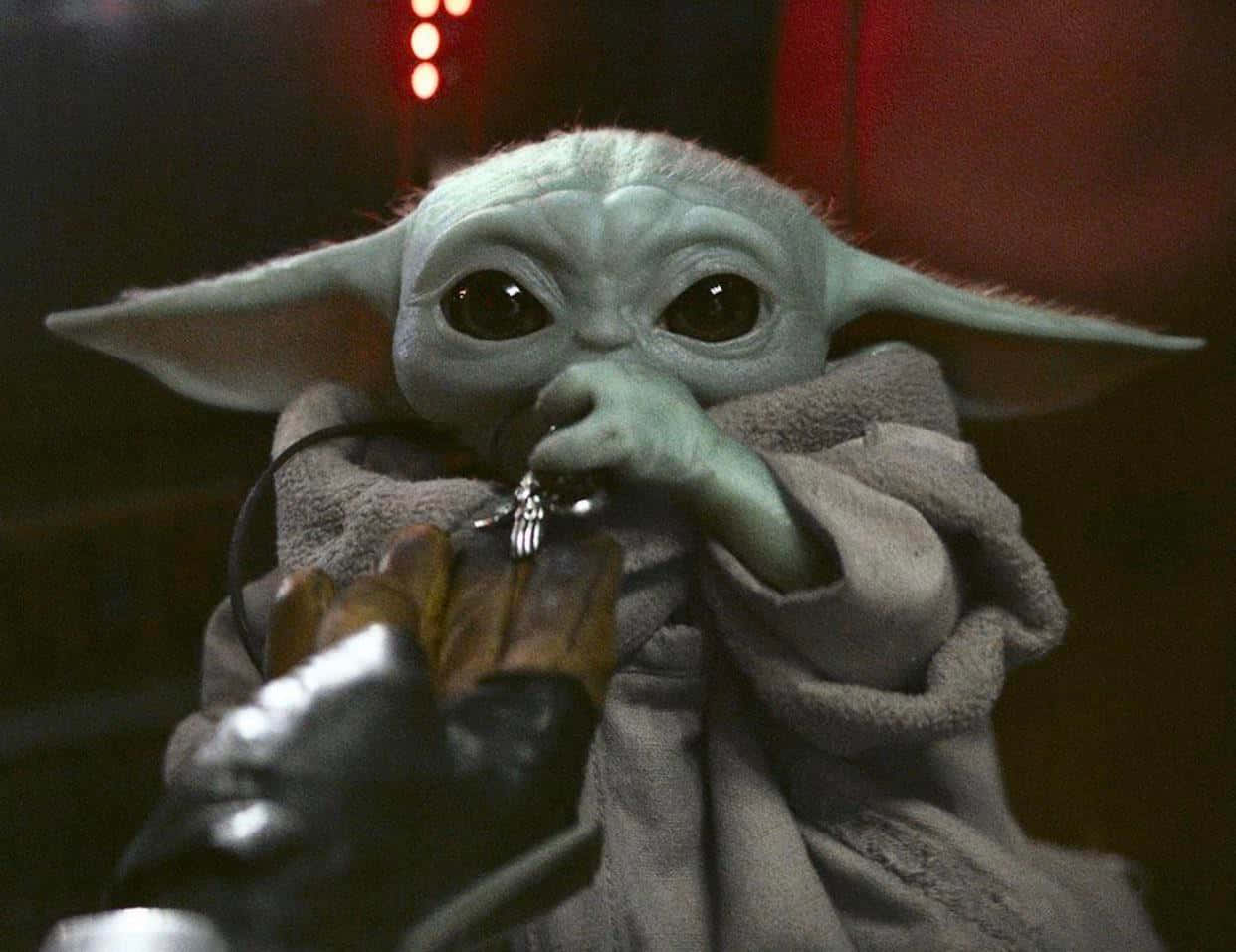 Cute Baby Yoda Sipping Picture