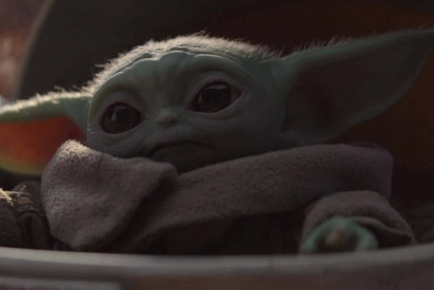 Cute Baby Yoda On A Dark Picture