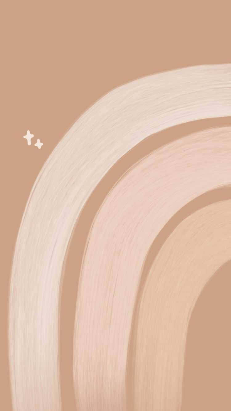 A Rainbow Of Beige And Brown Paint On A Beige Background Wallpaper