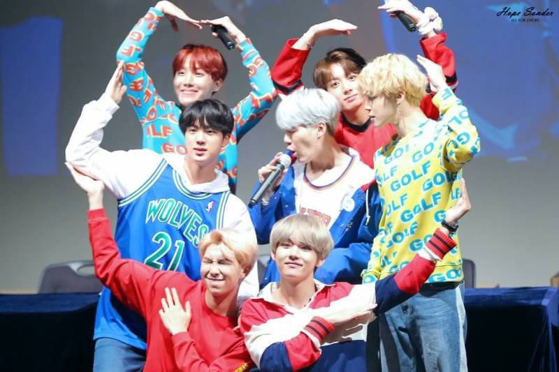 Cute Bts Group Does A Heart Pose Wallpaper