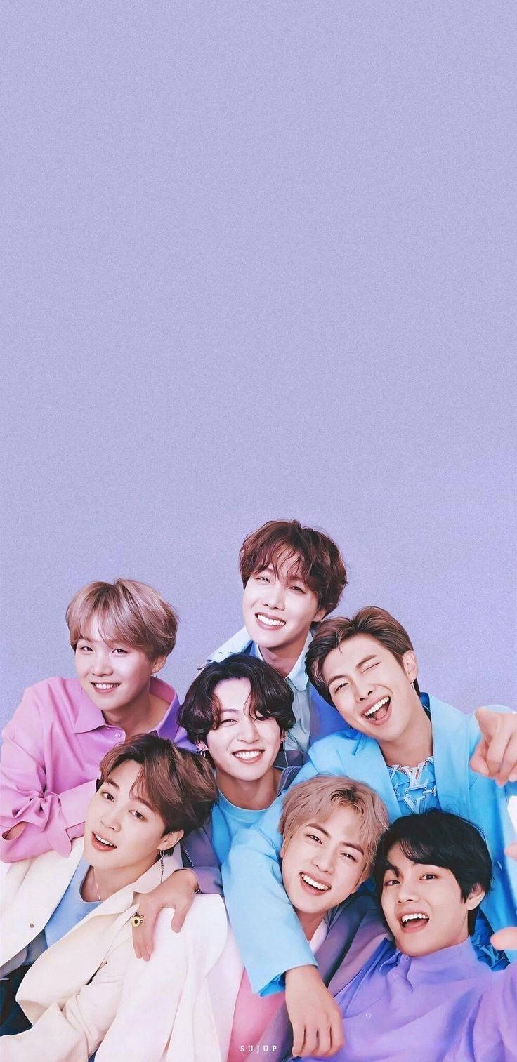 Cute BTS Group On Pastel Purple Hue Wallpaper