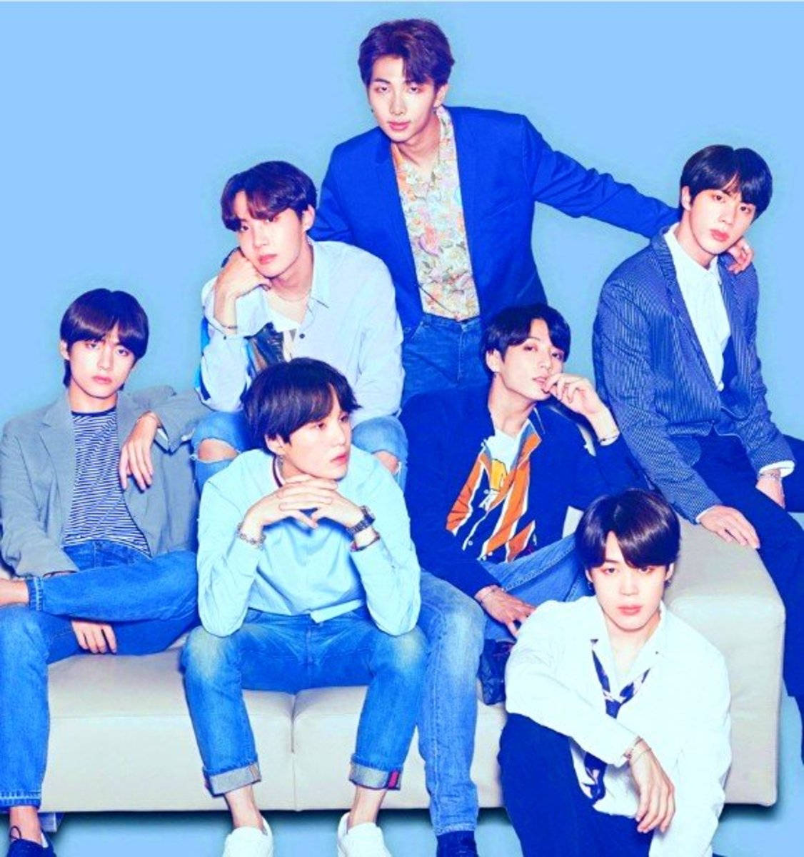 Cute Bts Group Wearing Different Shades Of Blue Wallpaper