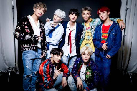 Cute Bts Group Wearing Messy Clothing Wallpaper
