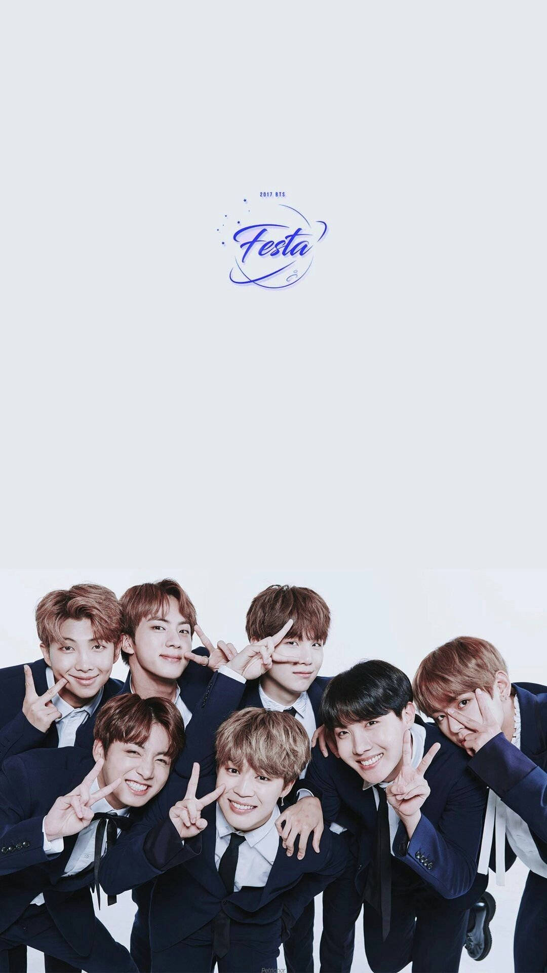 Cute Bts Group Wearing Suits On White Backdrop Wallpaper