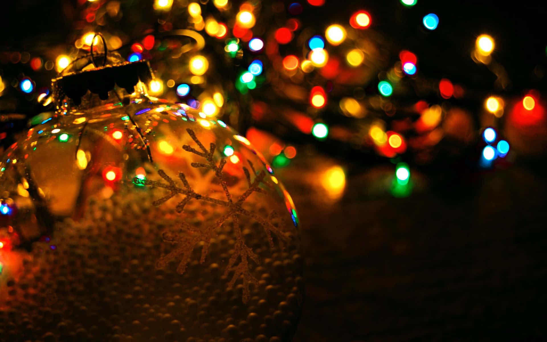 A Christmas Ball With Lights Wallpaper