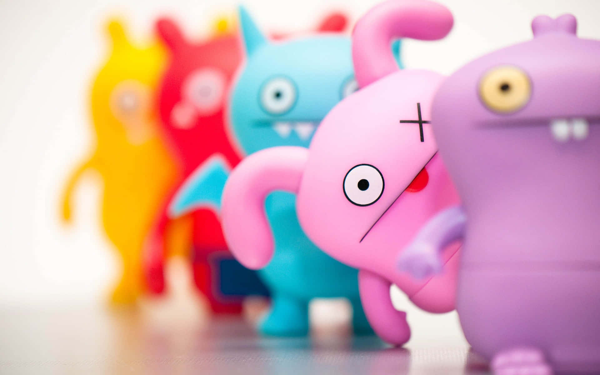 Cute Colorful Monster Toys Wallpaper