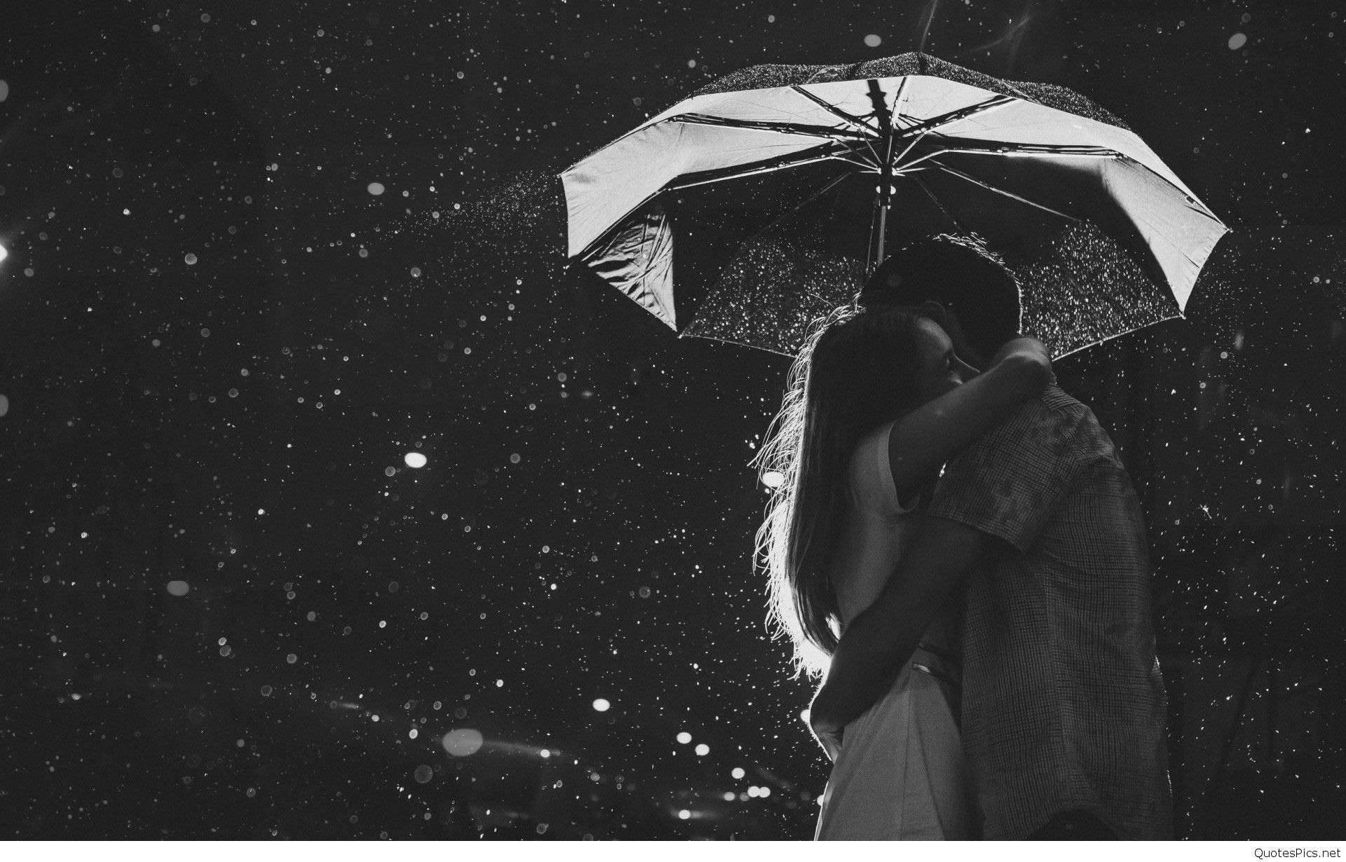 Cute Couple Hugging Under Umbrella