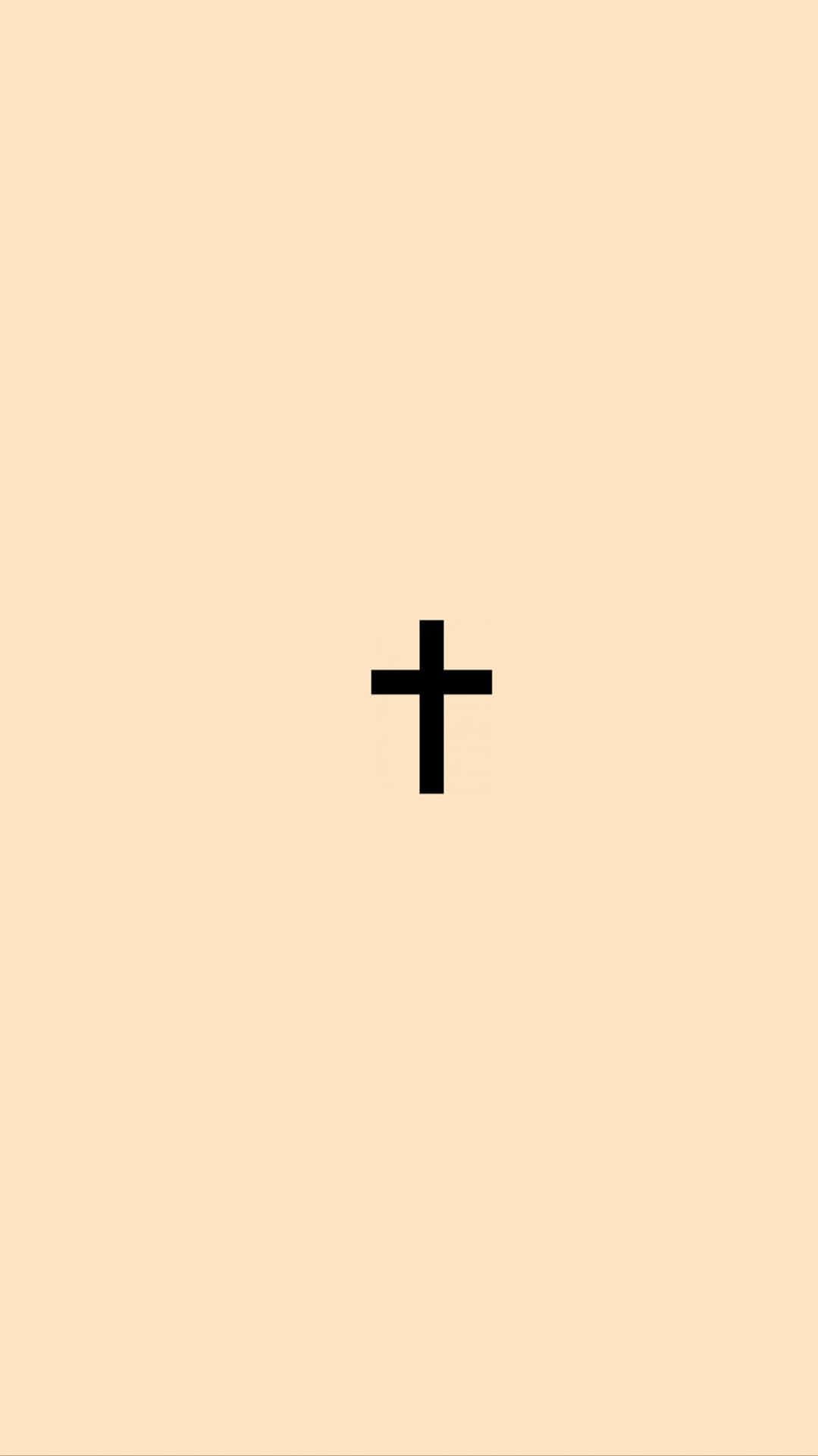 A Black Cross On A Beige Background Wallpaper