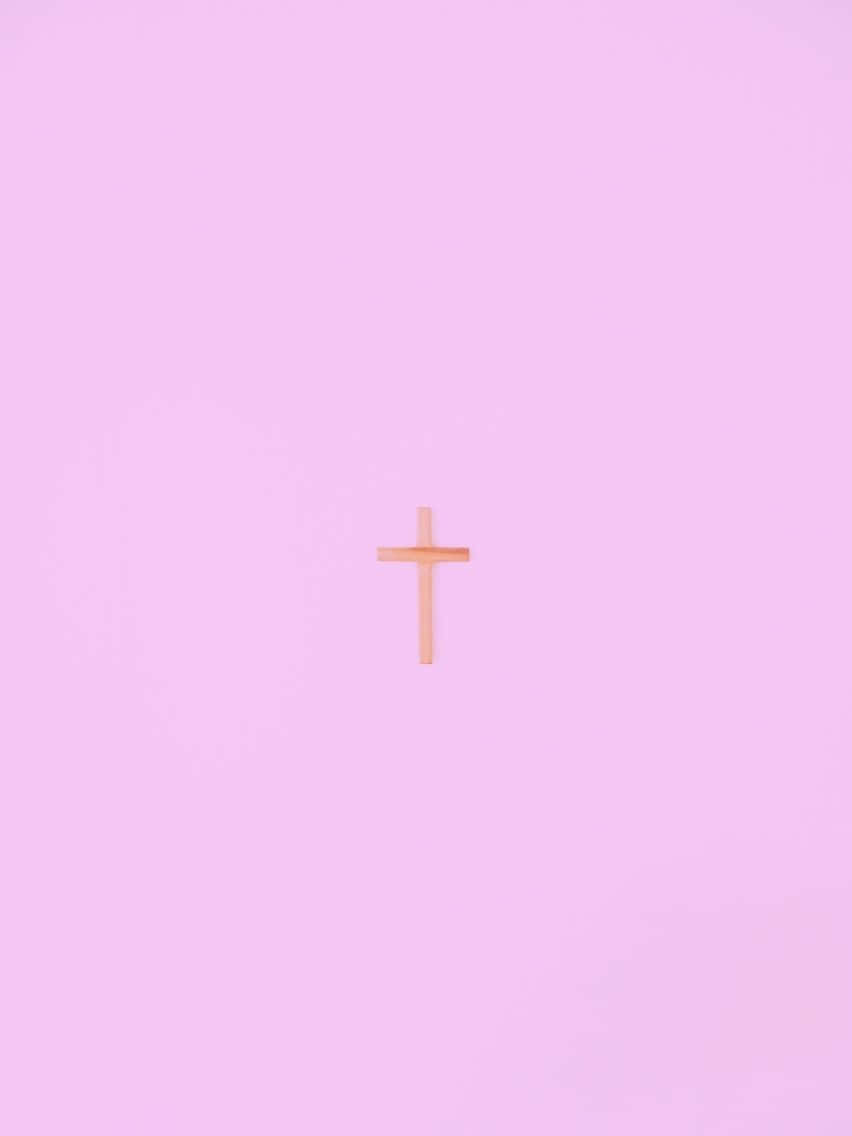 A Christian Cross Against A Brighter Background Wallpaper