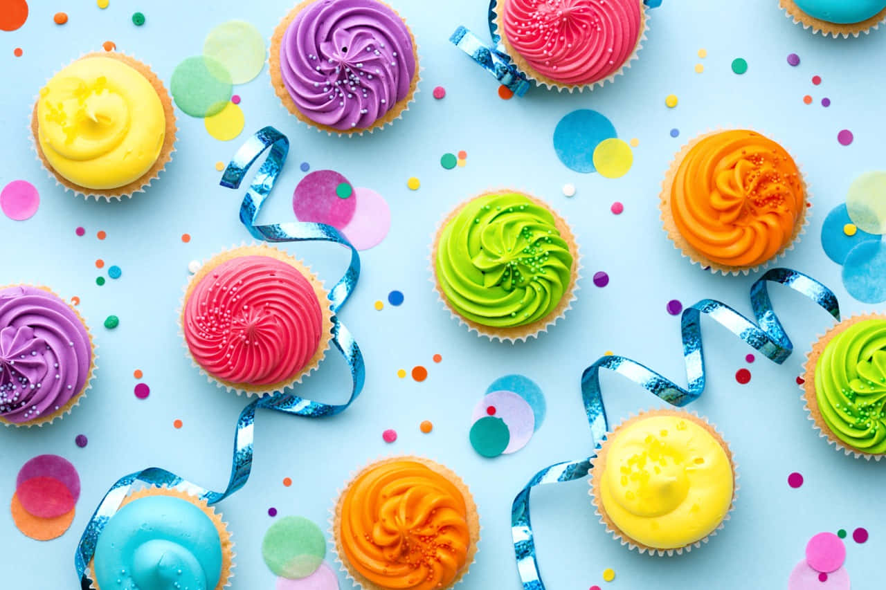 Adorable and Delicious Frosted Cupcake Wallpaper