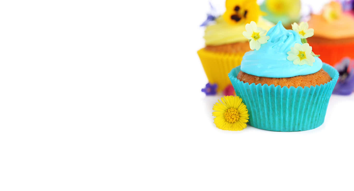 Adorable Cherry-Topped Cupcake with Colorful Sprinkles Wallpaper