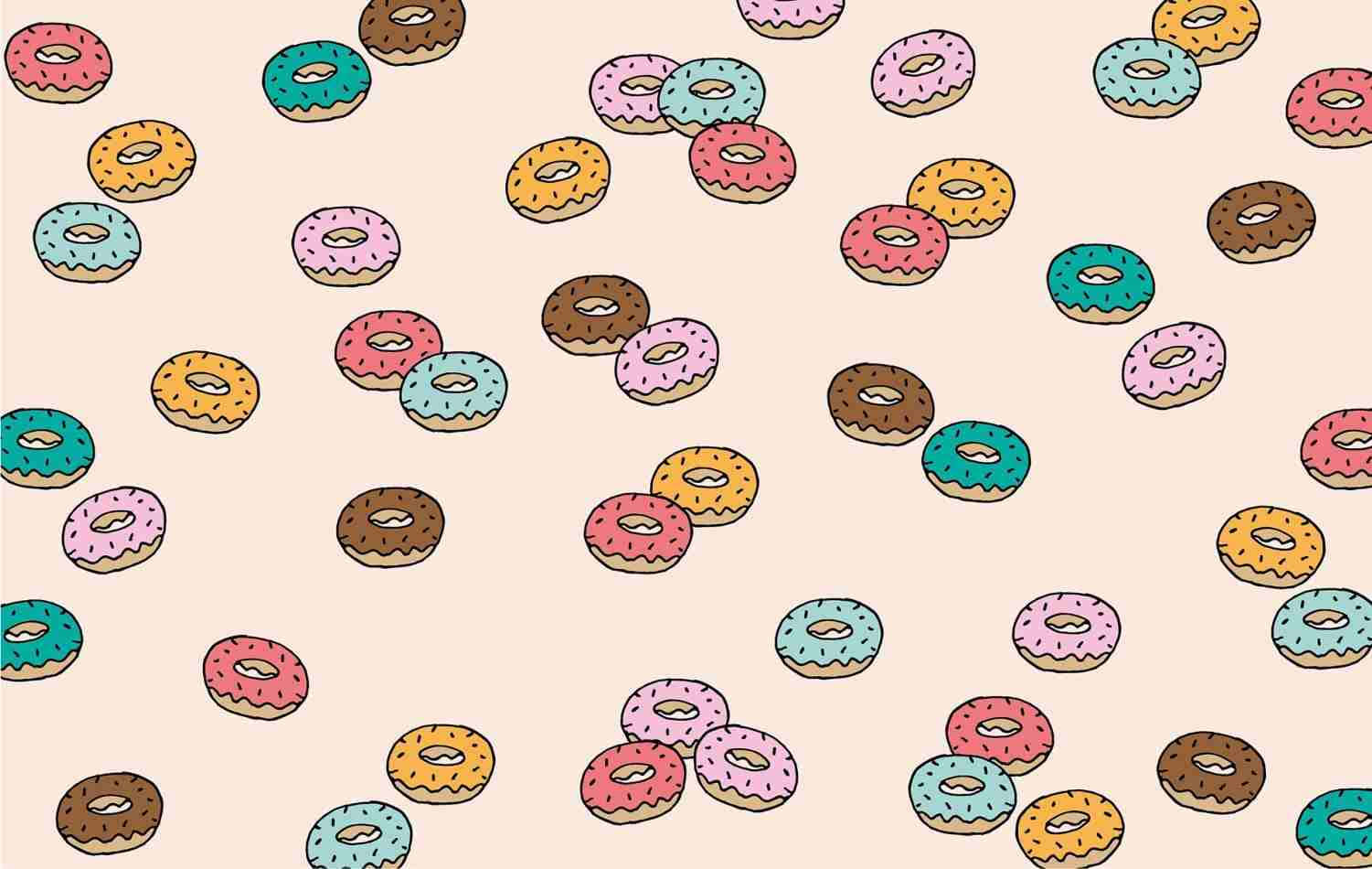 Cute and colorful donut smiling with a sprinkle topping Wallpaper