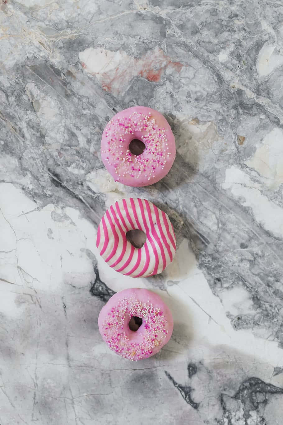 Irresistibly Adorable Donut with Colorful Sprinkles Wallpaper