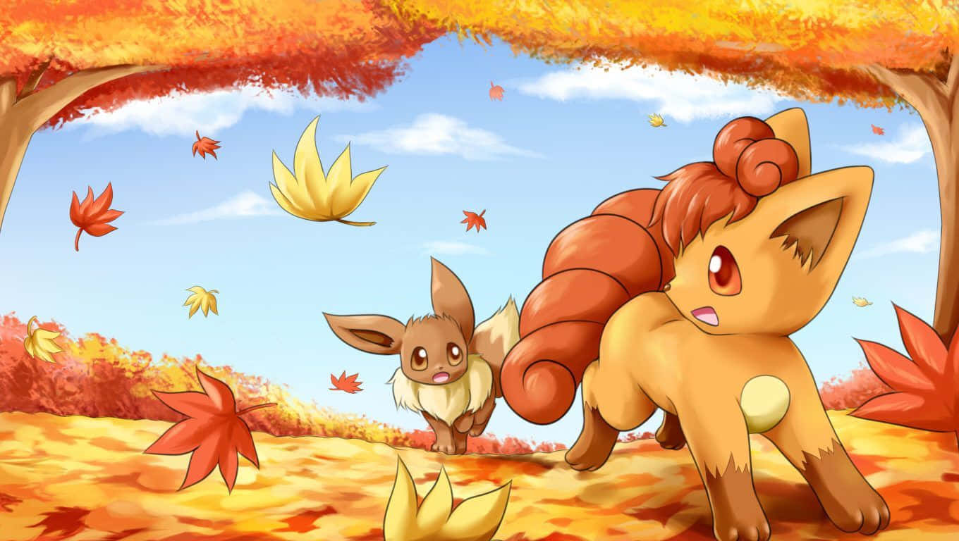 A Pair Of Pokemon Walking Through The Leaves Wallpaper