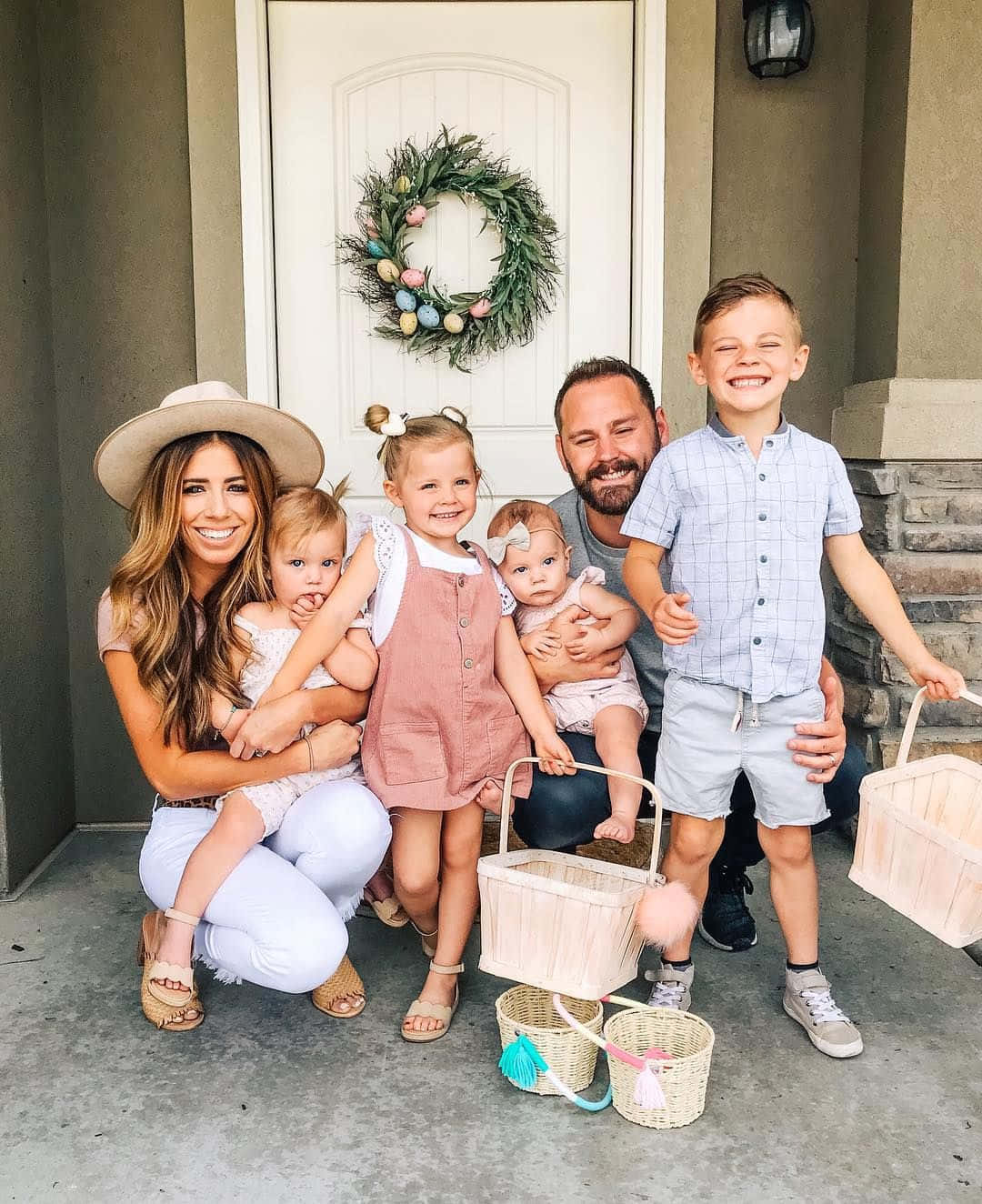 Cute Family In Front Of The Door Picture