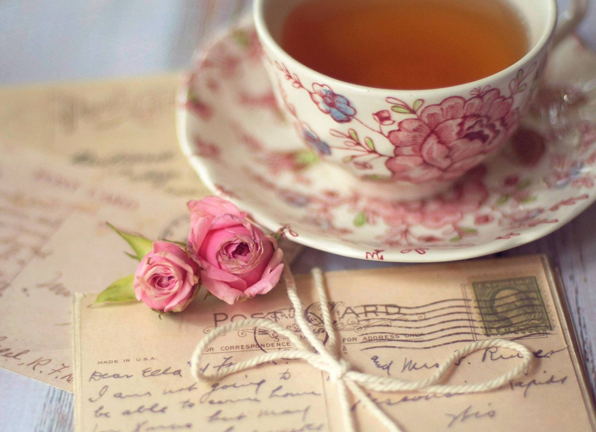 Cute Floral Tea Cup And Saucer Wallpaper