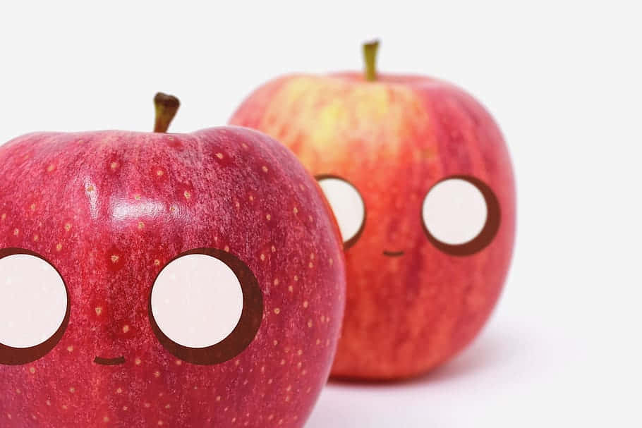 Cute Fruit Apples With Holes Wallpaper