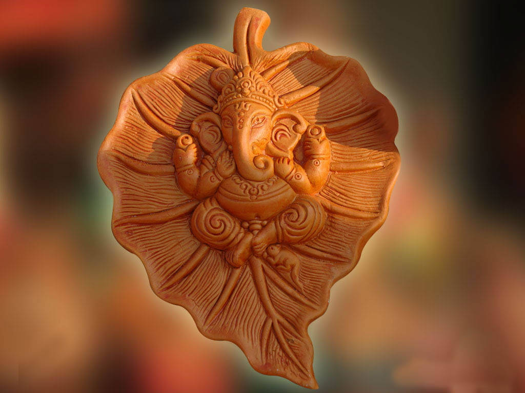 Download Cute Ganesha Artistic Leaf Wallpaper | Wallpapers.com