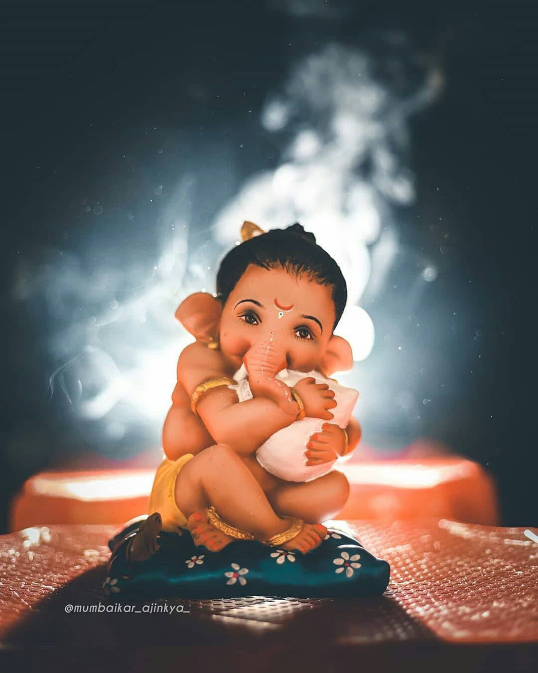 Download Cute Ganesha Hugging Makhan Wallpaper | Wallpapers.com