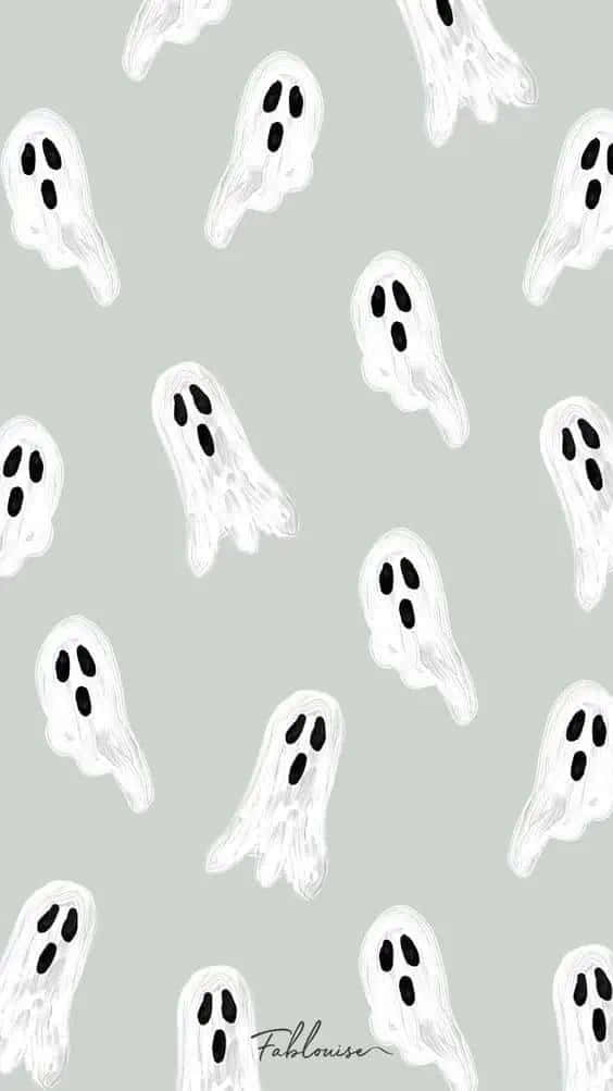 Cute ghost getting ready for Halloween! Wallpaper
