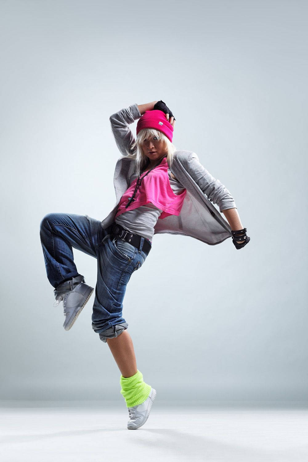 stylish and cool hip hop style dancer posing on white background Stock  Photo - Alamy
