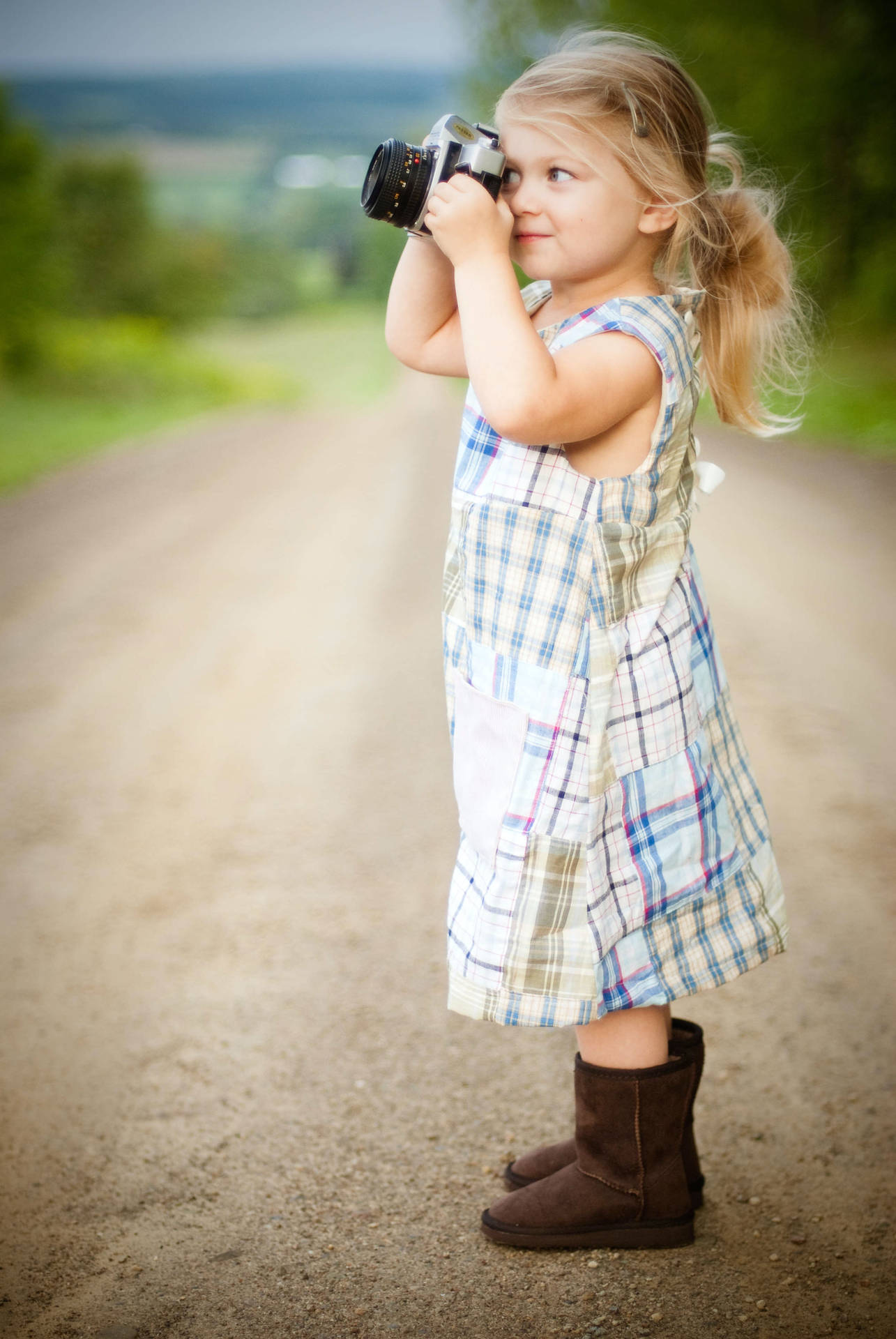 Cute Girl With Boots Taking Photos Wallpaper
