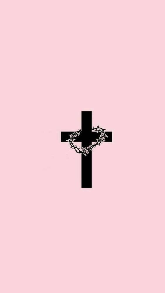 A Black Cross On A Pink Background Wallpaper