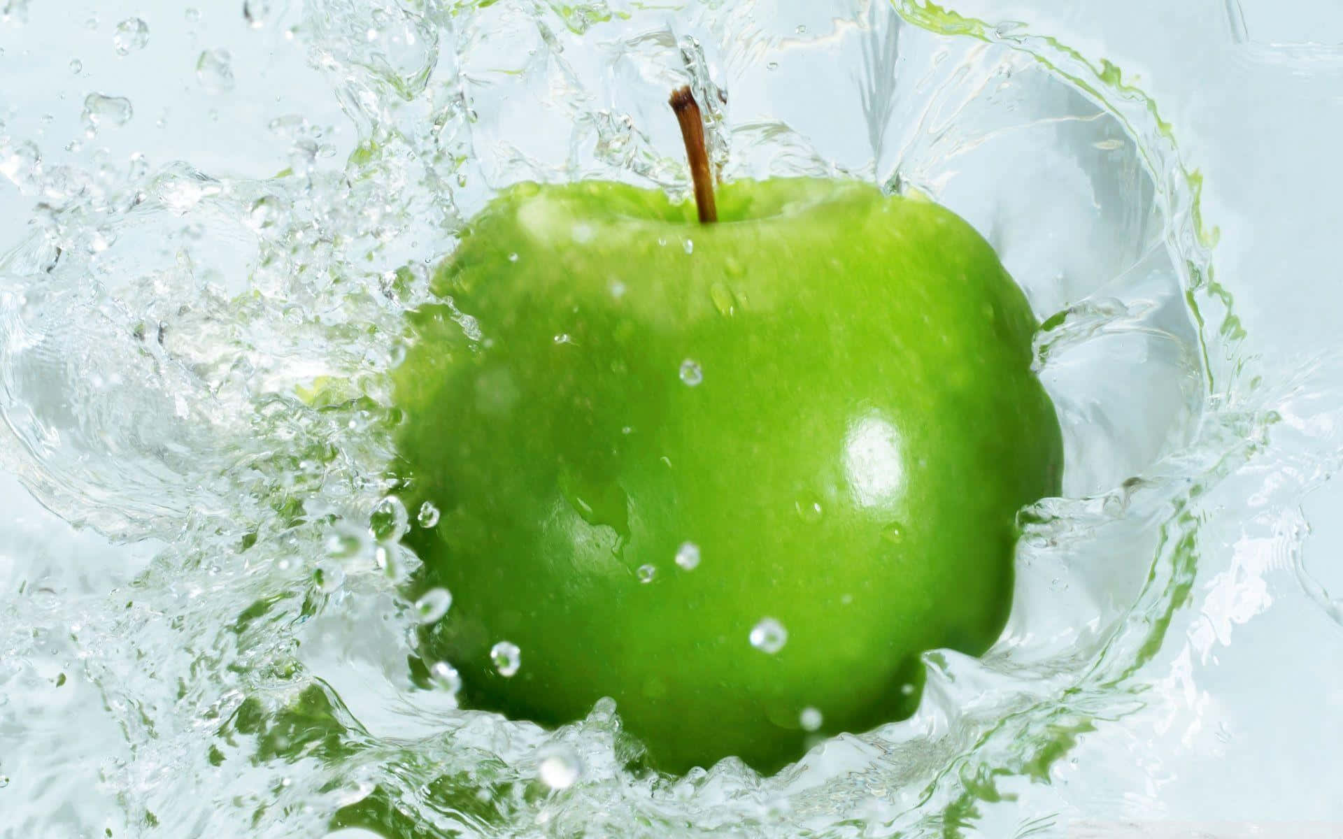 Green Apple Splashing Water