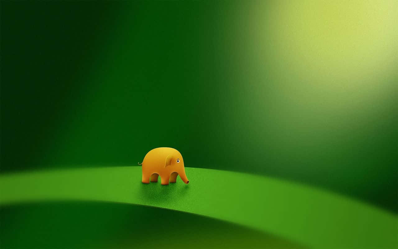 En lille gul elefant står på et grønt blad. Wallpaper