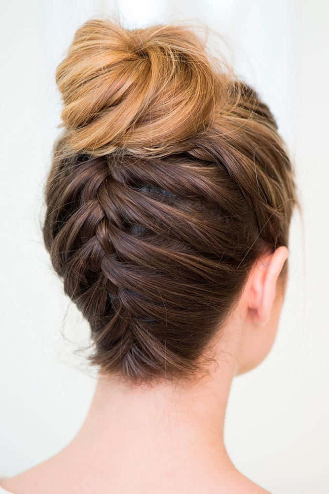 A Woman With A Braided Updo