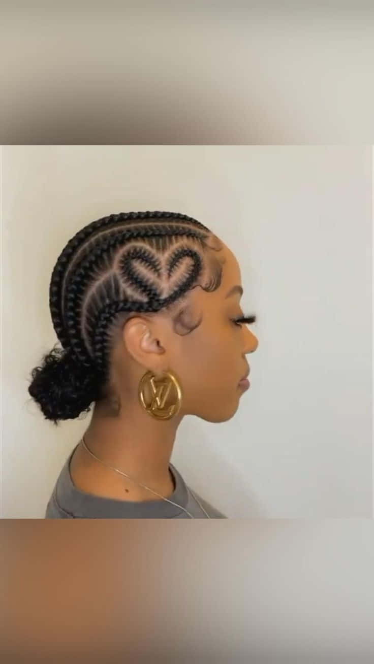 A Woman With Braids In Her Hair