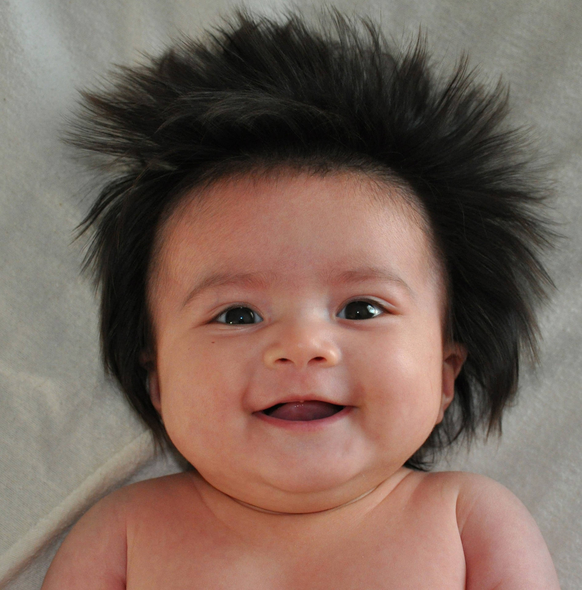 Charming Cuteness Overload: Hairy Funny Baby Wallpaper