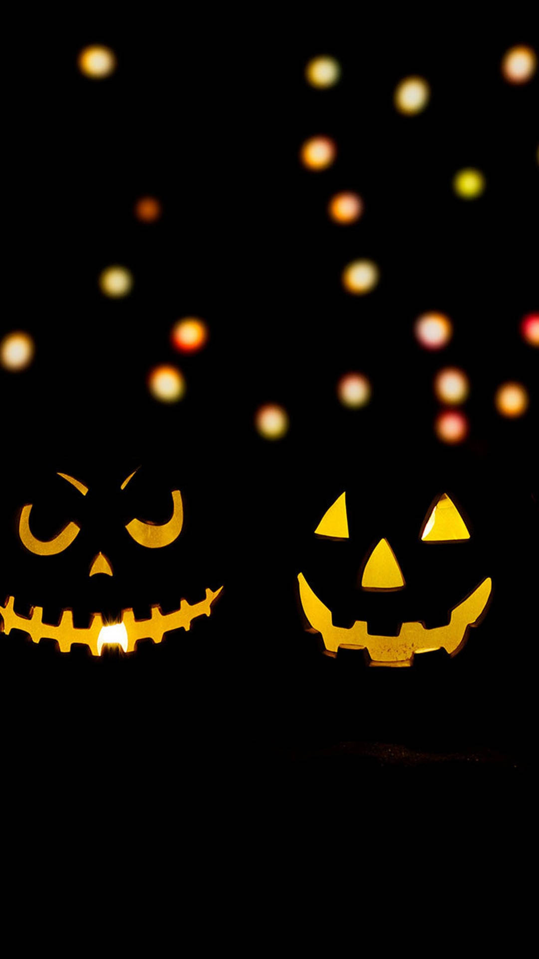Lindofondo De Pantalla De Halloween Para El Teléfono Con Una Linterna De Calabaza Brillante. Fondo de pantalla