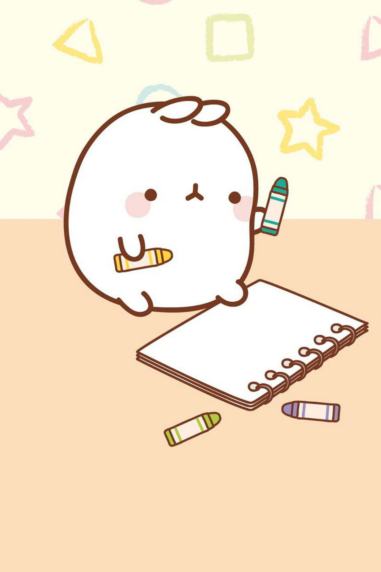 A White Bunny With Crayons And A Notebook