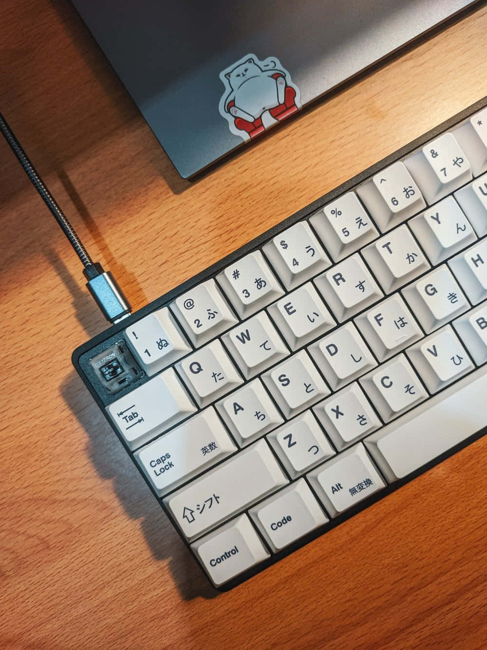 A Keyboard With A Mouse And A Laptop On It