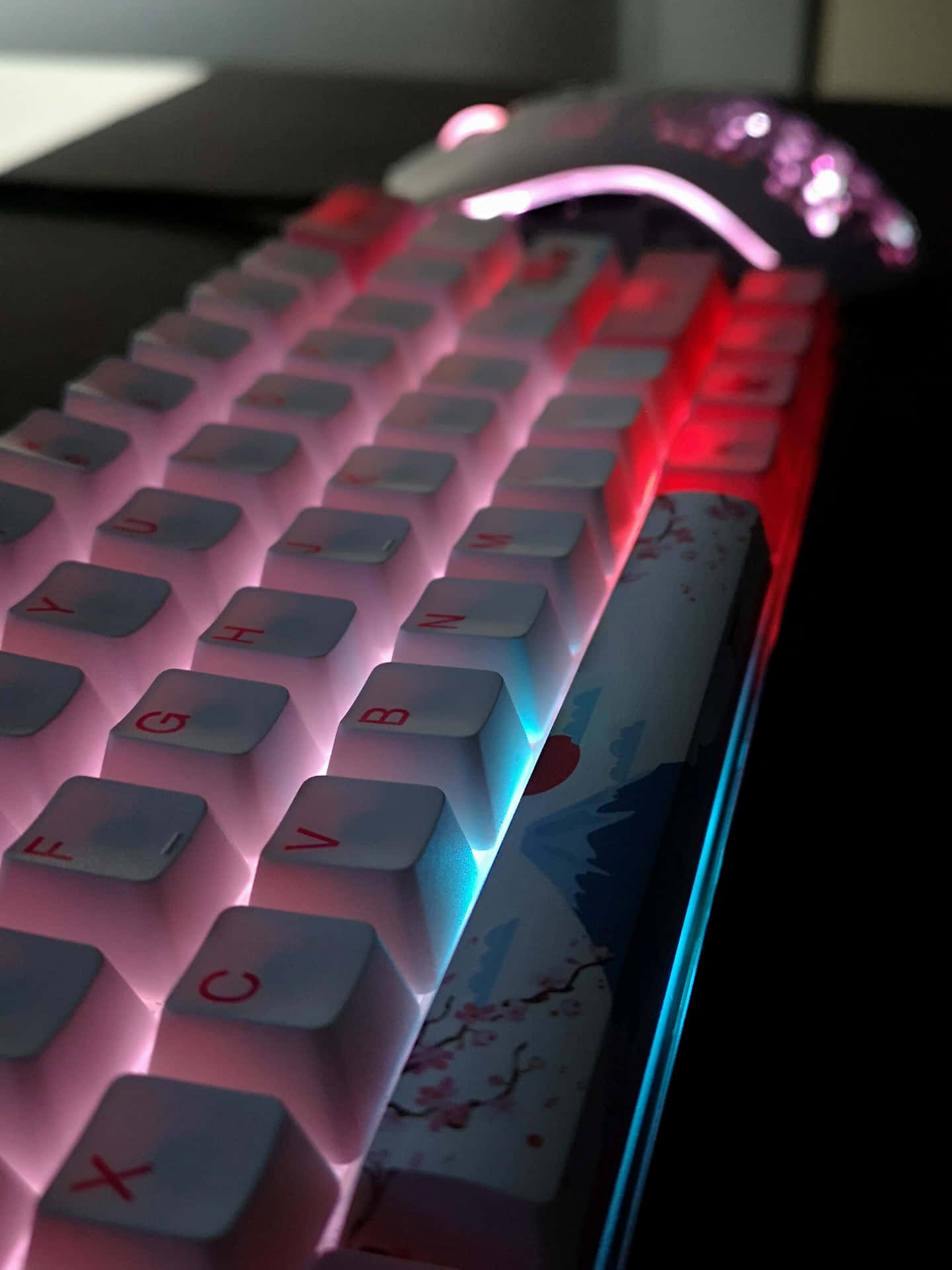 A Keyboard With Red And Blue Lights On It