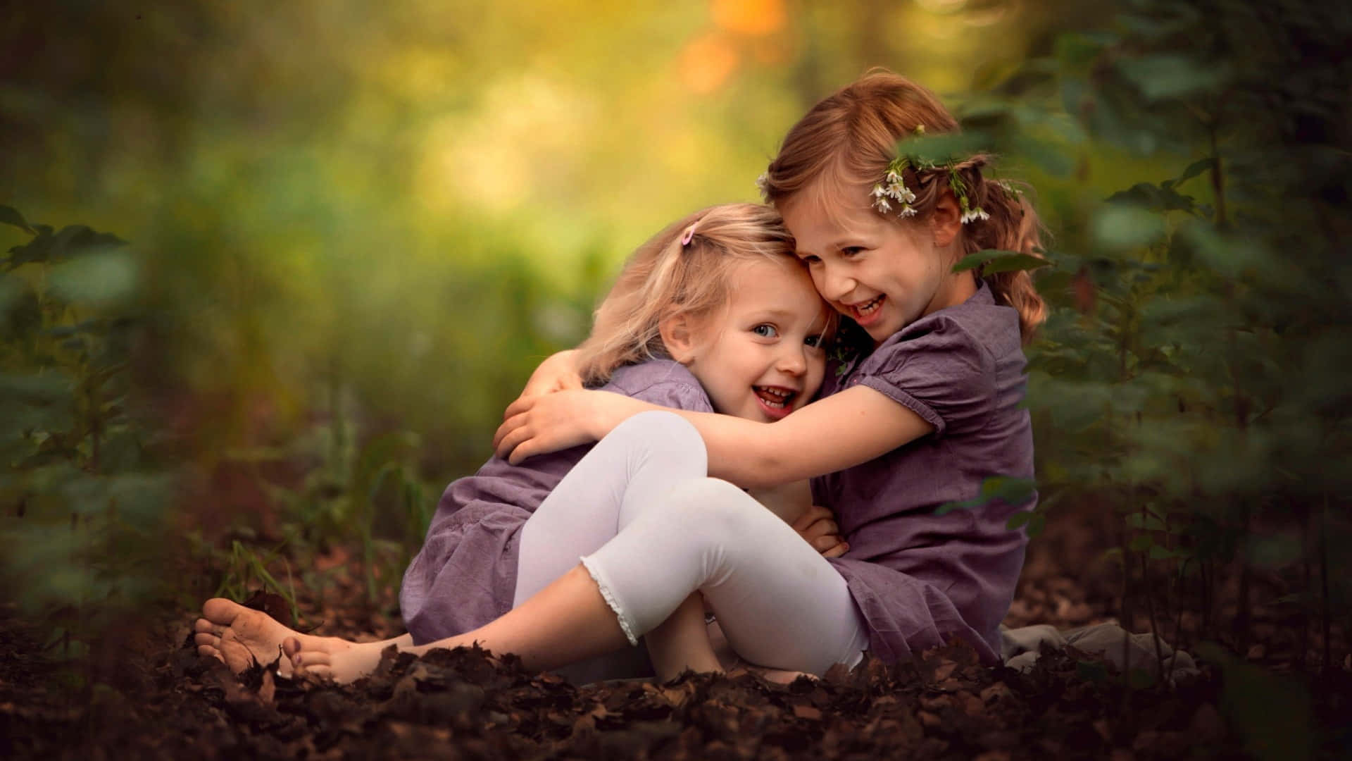 Adorable Kids Smiling Outdoors Wallpaper