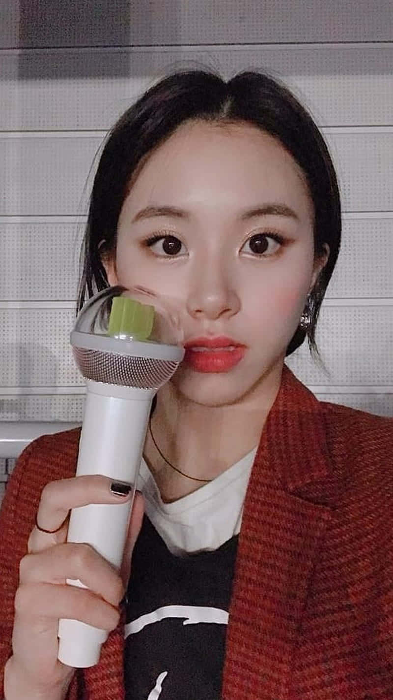 Carino,cantante Coreana Chaeyoung Con Il Suo Light Stick. Sfondo