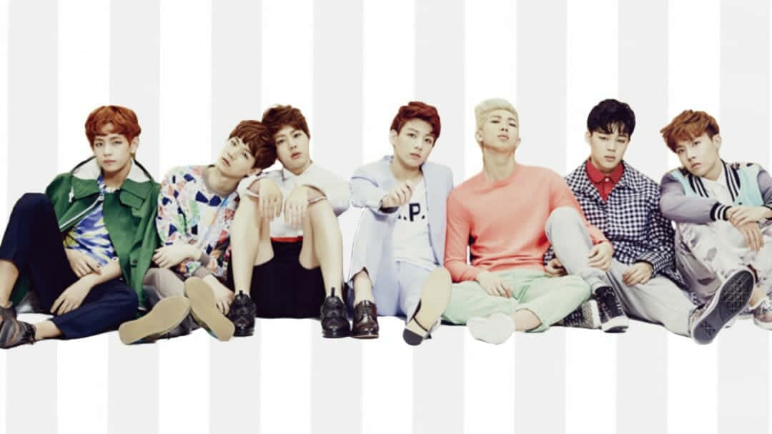 Check out this cute Kpop group showing their playful side! Wallpaper