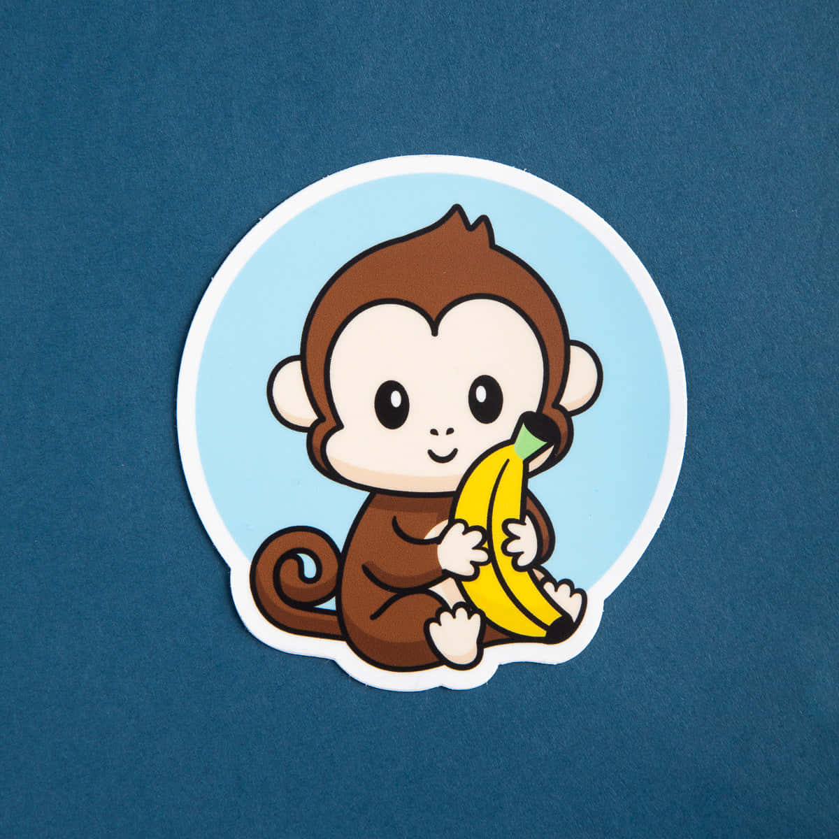 Fotocarina Di Una Scimmia Con Una Banana Sfondo
