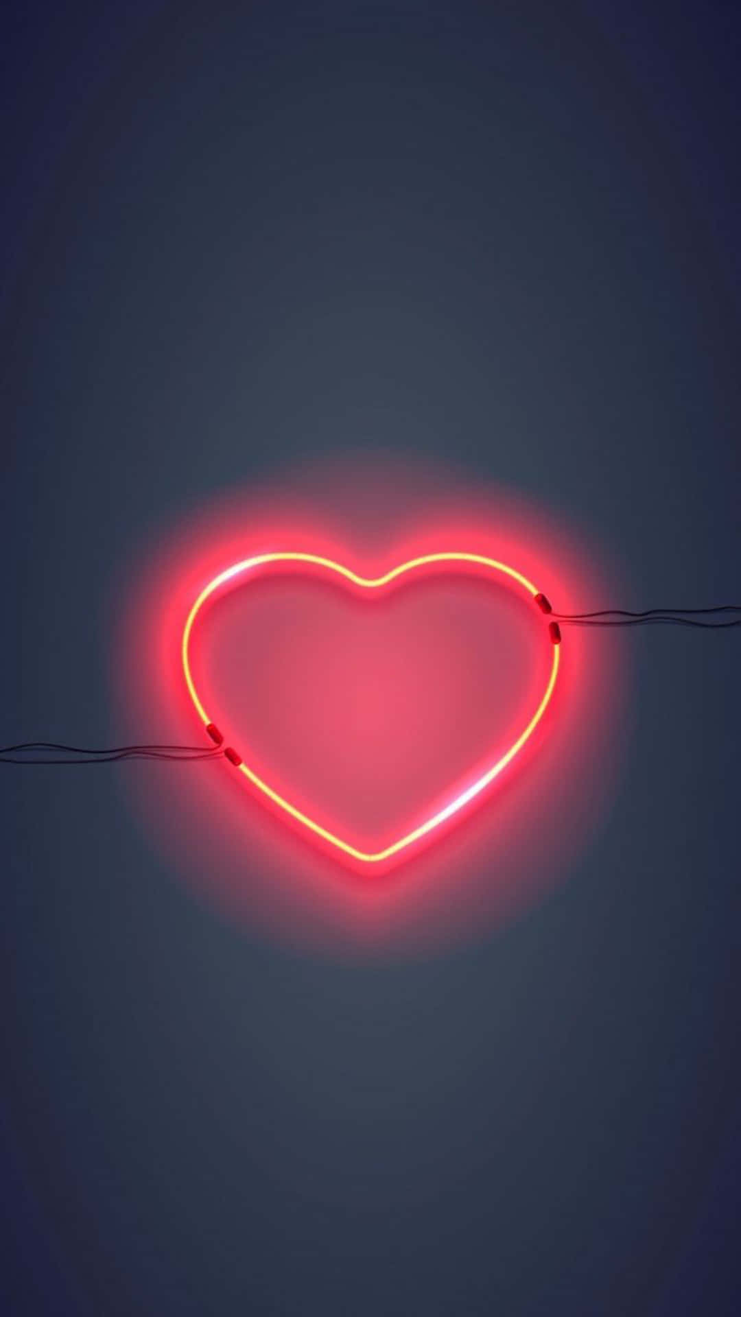 Einerote Herz-neonschrift Auf Dunklem Hintergrund Wallpaper