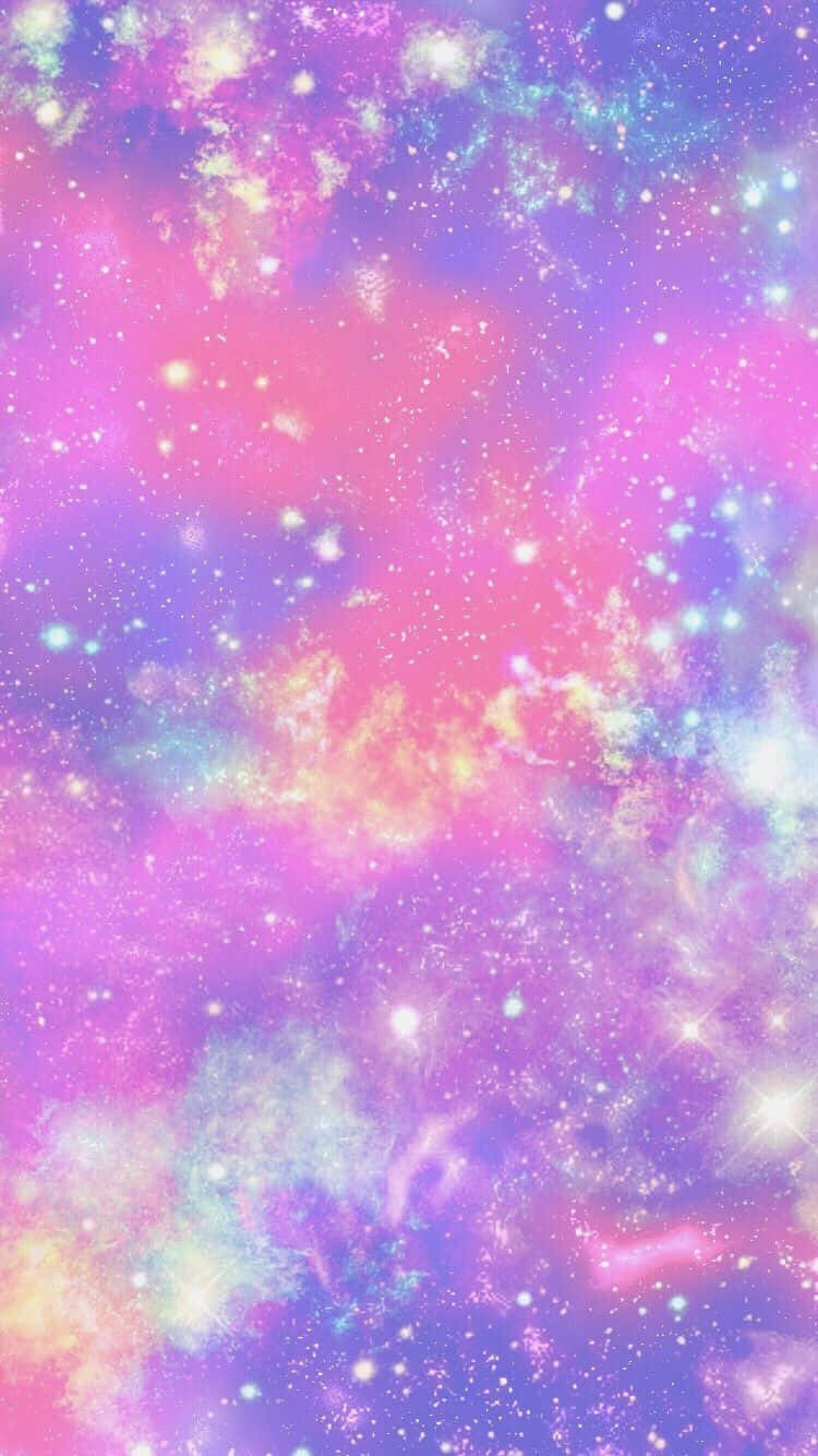 Nyd farverne af universet med denne søde pastelfarvede galakse tapet. Wallpaper