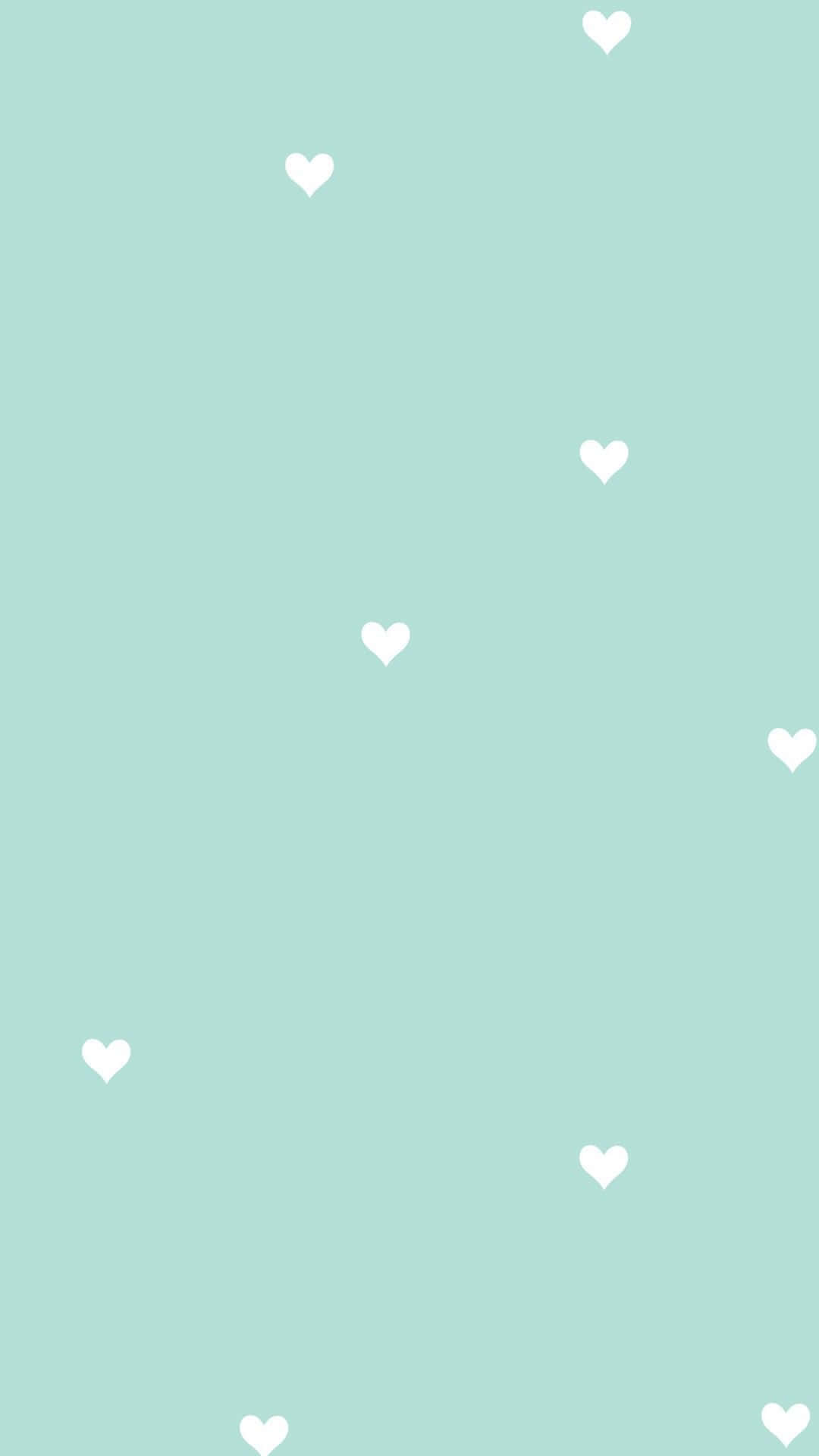 Sød pastelgrøn sød lille hjerte mønster Wallpaper