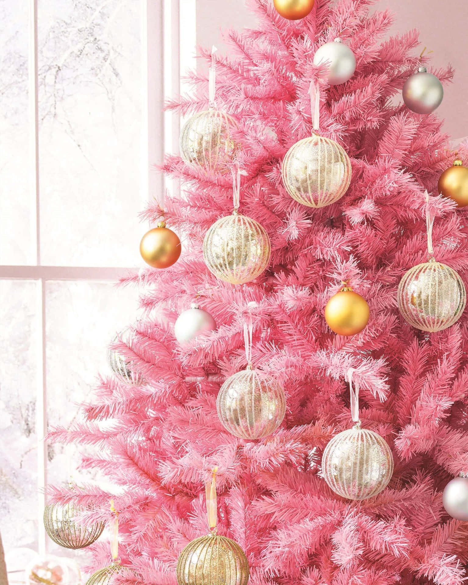 Pink Christmas Tree With Gold Ornaments Wallpaper