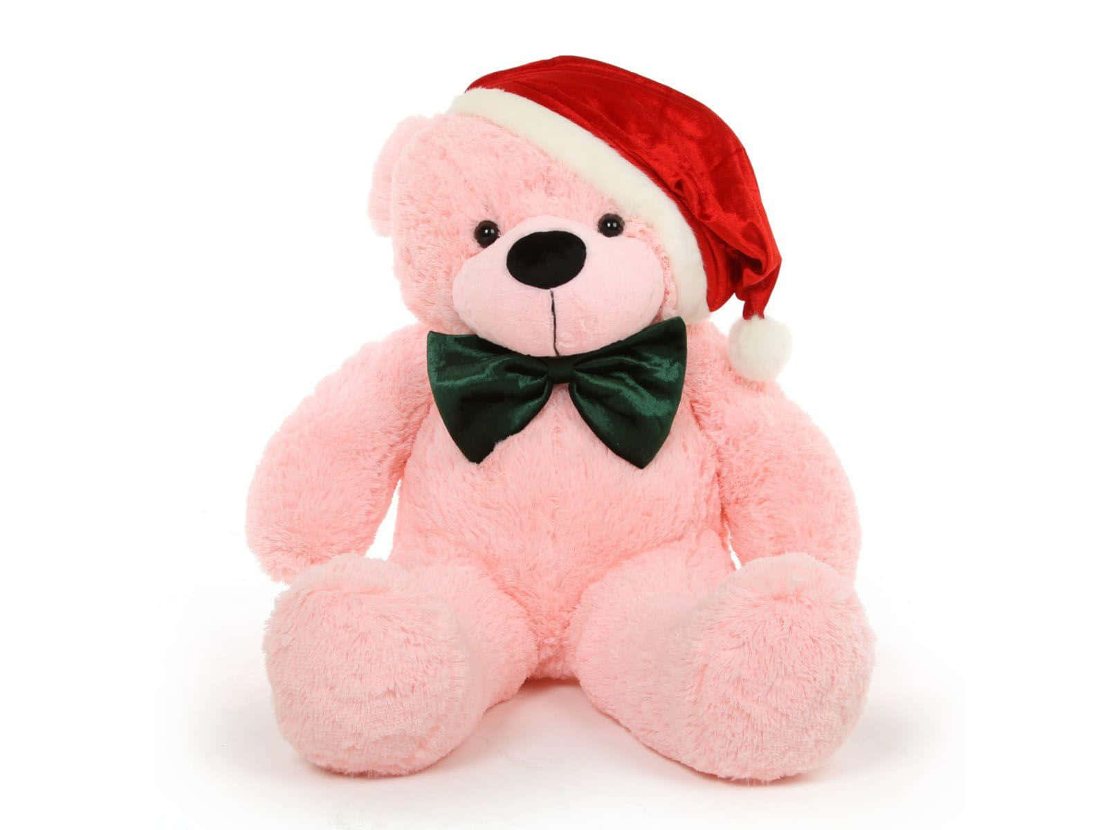 Adorable Pink Teddy Bear Festively adorned for Christmas Wallpaper
