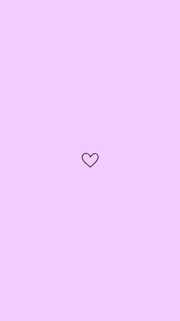A Heart On A Pink Background