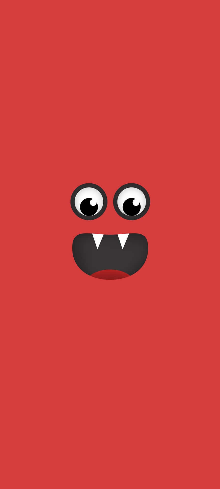 En rød monsterhoved med sorte øjne Wallpaper